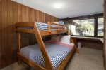 The fourth bedroom offers a twin over full bunk bed